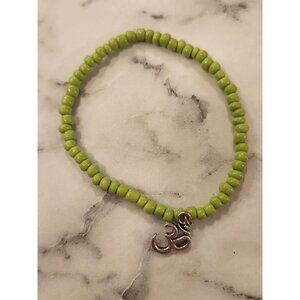 Green Beaded Bracelet with Silver Om Charm - Yoga, Spiritual, Stretchy Design